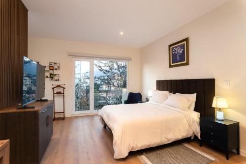 เตียงในห้องที่ Edificio Torremia monoambiente