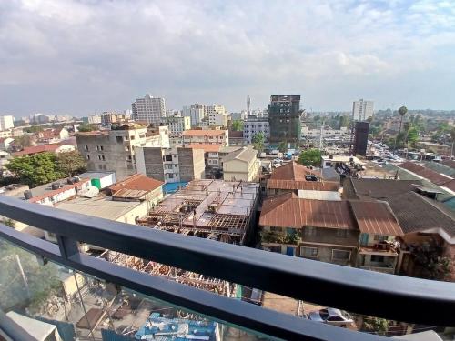 a view of a city from a balcony at Akb Home Nyayo Studio in Nairobi