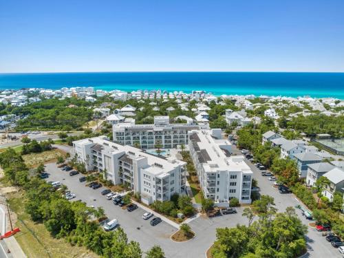 an aerial view of the apartment buildings at the beach at The Pointe Unit 321 by 30A Escapes in Rosemary Beach