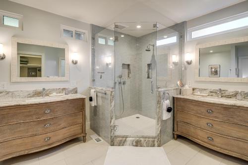 a bathroom with two sinks and a shower at Walk to Ocean Luxe Family Home in Half Moon Bay! in Half Moon Bay