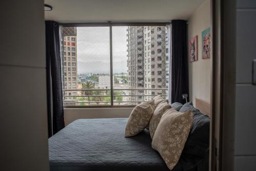 Ένα ή περισσότερα κρεβάτια σε δωμάτιο στο Apartartment 2 Bedrooms Suite Macul Metro Fully Equipped