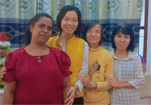 a group of women standing next to each other at Sun Reich - Airport Transit Hotel in Katunayake