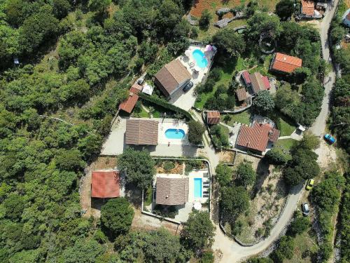 an aerial view of a house with a yard at Villa Androcec in Žgaljić