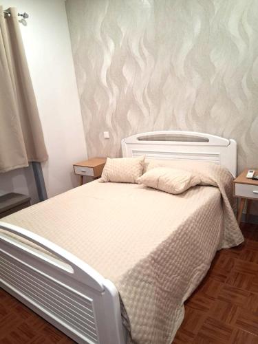 Ένα ή περισσότερα κρεβάτια σε δωμάτιο στο Guest House Morais