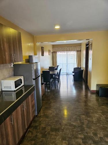 ครัวหรือมุมครัวของ Progressive Park Hotel