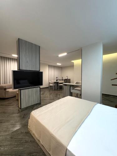 Televisyen dan/atau pusat hiburan di Hayah Inn Cairo - Rehab City