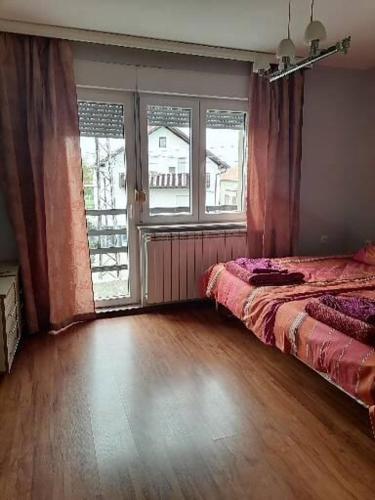 Postel nebo postele na pokoji v ubytování Jovana