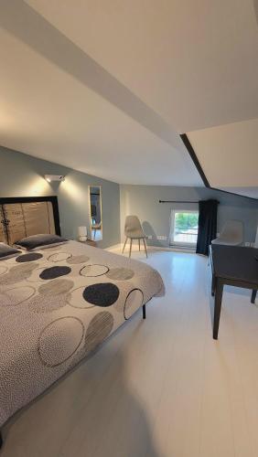 Llit o llits en una habitació de Gîte de Catherine