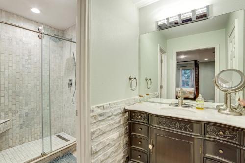 a bathroom with a shower and a sink and a mirror at Walk to Lake Athens! Updated Home with Large Deck in Murchison