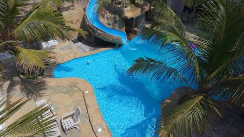 Der Swimmingpool an oder in der Nähe von La Playita Casa de Playa con Piscina Jacuzzi y Acesso directo al Mar