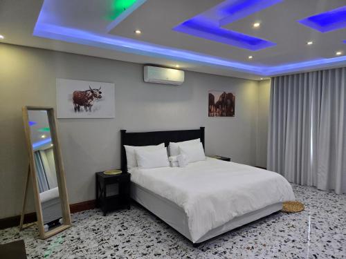 Ένα ή περισσότερα κρεβάτια σε δωμάτιο στο Nombango Guest House