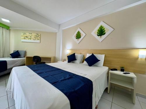 Ένα ή περισσότερα κρεβάτια σε δωμάτιο στο MoviHosts Marsallis