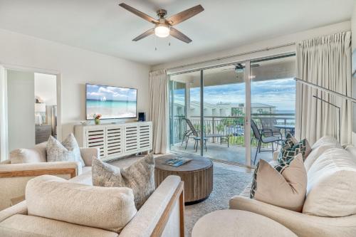 a living room with couches and a ceiling fan at HP 422 Blue Haven by 30A Escapes in Rosemary Beach