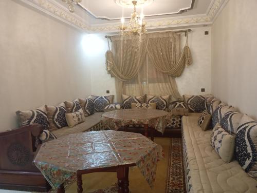 Ruang duduk di Appartement rez de chaussée