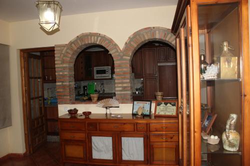 Virtuvė arba virtuvėlė apgyvendinimo įstaigoje Casa Rural Antikaria