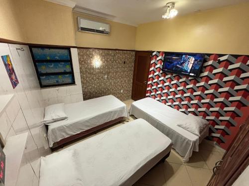 Μια τηλεόραση ή/και κέντρο ψυχαγωγίας στο barbershopcavalheiro