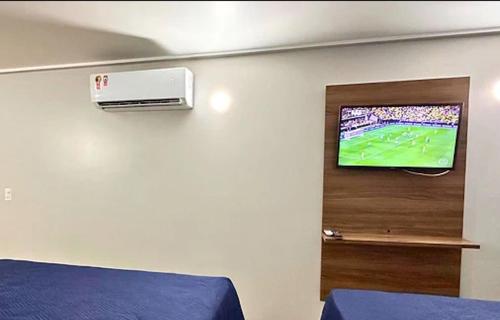 TV a/nebo společenská místnost v ubytování Flats Cabo Branco