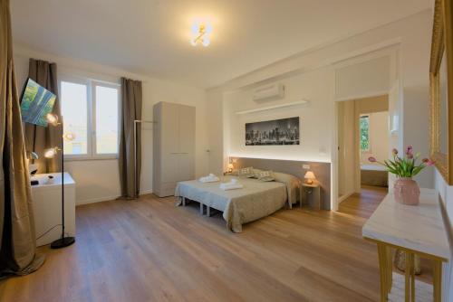 Ένα ή περισσότερα κρεβάτια σε δωμάτιο στο Camera Tokyo - La Casa di Carta Affittacamere