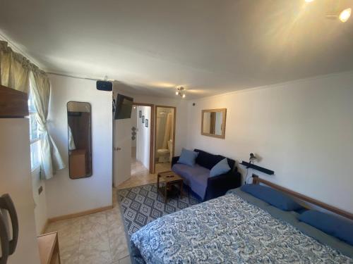 Postel nebo postele na pokoji v ubytování Cabaña Vista a la plaza