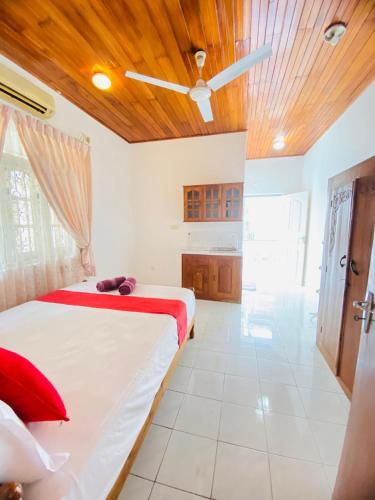 Ένα ή περισσότερα κρεβάτια σε δωμάτιο στο The Kingsway Guesthouse