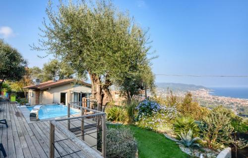 a villa with a swimming pool and a garden at Casa Persi in Gorleri