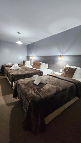 Postel nebo postele na pokoji v ubytování Essencial Hotel Spa