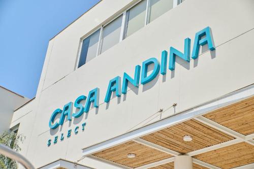 a sign on the side of a building at Casa Andina Select Paracas in Paracas