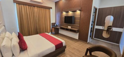 TV a/nebo společenská místnost v ubytování The Lychee Hotel & Resort