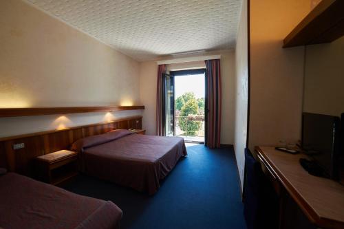 Hotel Giardinoにあるベッド