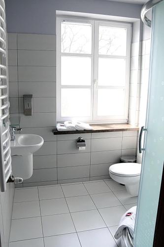 Ein Badezimmer in der Unterkunft Ośrodek Architektury i Humanistyki