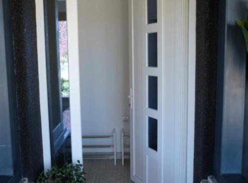 an open door to a room with a hallway at Apartments Ro Ma in Novo Selo Požeško