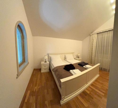 Ένα ή περισσότερα κρεβάτια σε δωμάτιο στο Villa Garden Club