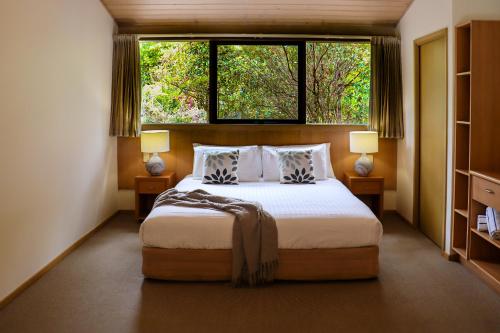 Postel nebo postele na pokoji v ubytování Gipsy Point Lakeside