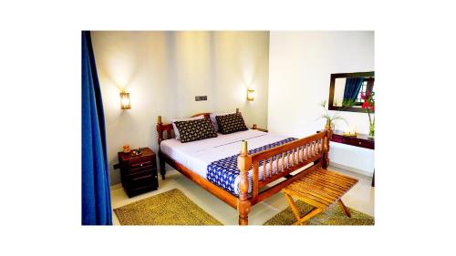 Postel nebo postele na pokoji v ubytování BREATHE Collections Habaraduwa