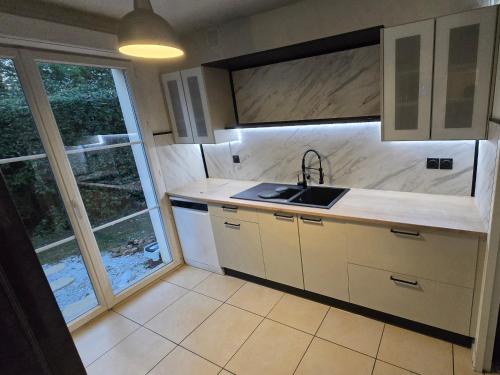 Køkken eller tekøkken på Villas du Golf Domaine Royal Green