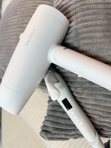 a wii remote on top of a pile of towels at ブレイブベース糸島 in Itoshima