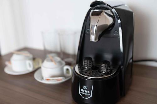 Příslušenství pro přípravu čaje a kávy v ubytování Villa Marala