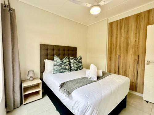 Postel nebo postele na pokoji v ubytování Ballito Hills