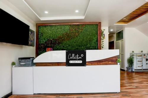 TV a/nebo společenská místnost v ubytování Hotel O Apple Grand