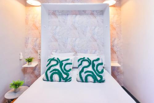 Postel nebo postele na pokoji v ubytování WS Hôtel de Ville - Beaubourg