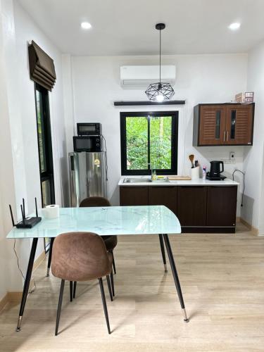 Η κουζίνα ή μικρή κουζίνα στο The Summer Cozy Cottage