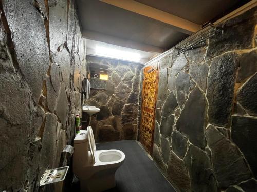 Koupelna v ubytování Rumsu Tree House by SLC