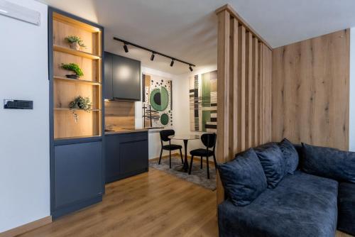 a living room with a couch and a table at Vidikovac-Berane in Berane