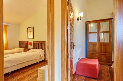 Postel nebo postele na pokoji v ubytování La Aldeilla