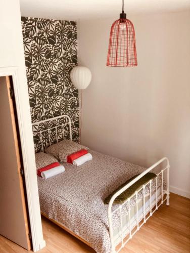 Postel nebo postele na pokoji v ubytování La petite Maison