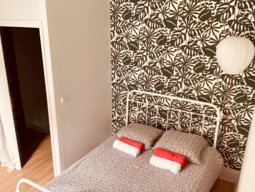 Ein Bett oder Betten in einem Zimmer der Unterkunft La petite Maison