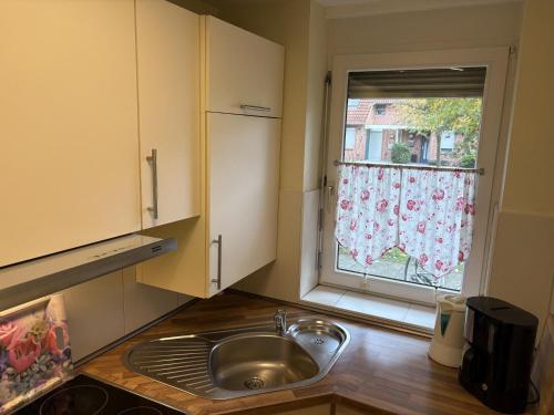 Η κουζίνα ή μικρή κουζίνα στο Ferienhaus "MeerZeit"