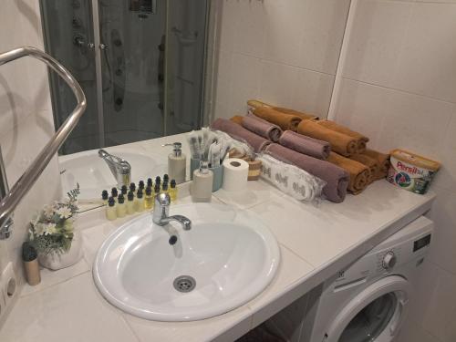 a bathroom counter with a sink and a mirror at Tallinna mnt 15 Apartament in Narva