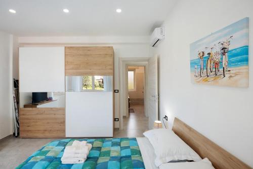 Postel nebo postele na pokoji v ubytování Paestum Eden