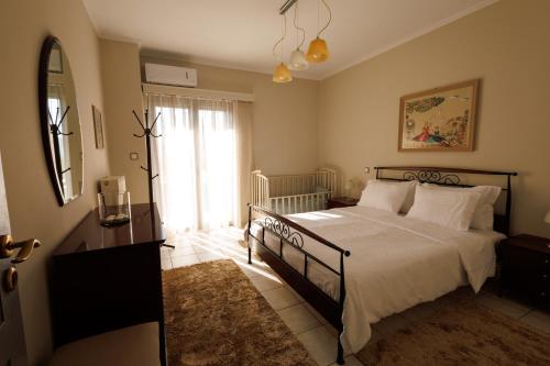 Ένα ή περισσότερα κρεβάτια σε δωμάτιο στο White lavender house